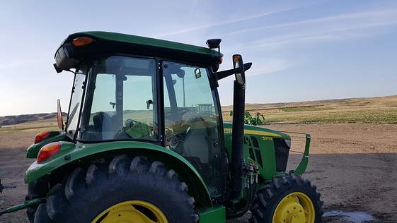 John Deere tractor with Emlid Reach RS on top 2